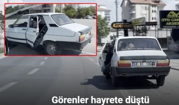 Otomobile motor yükledi, kapısı açık trafikte seyretti