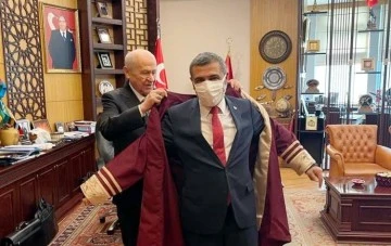 TAŞDOĞAN'A CÜBBEYİ BAHÇELİ GİYDİRDİ